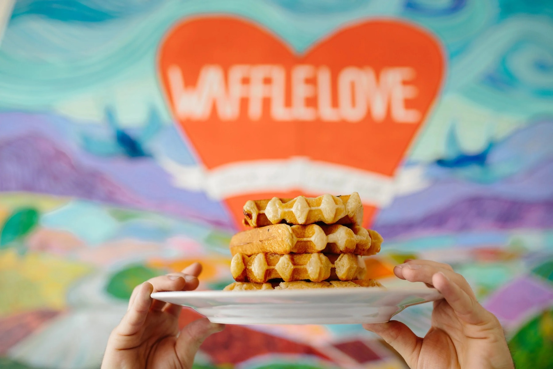 Stack of waffles with toppings